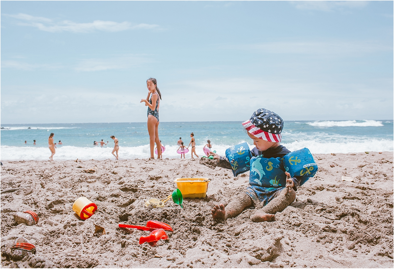 Child playing in sand