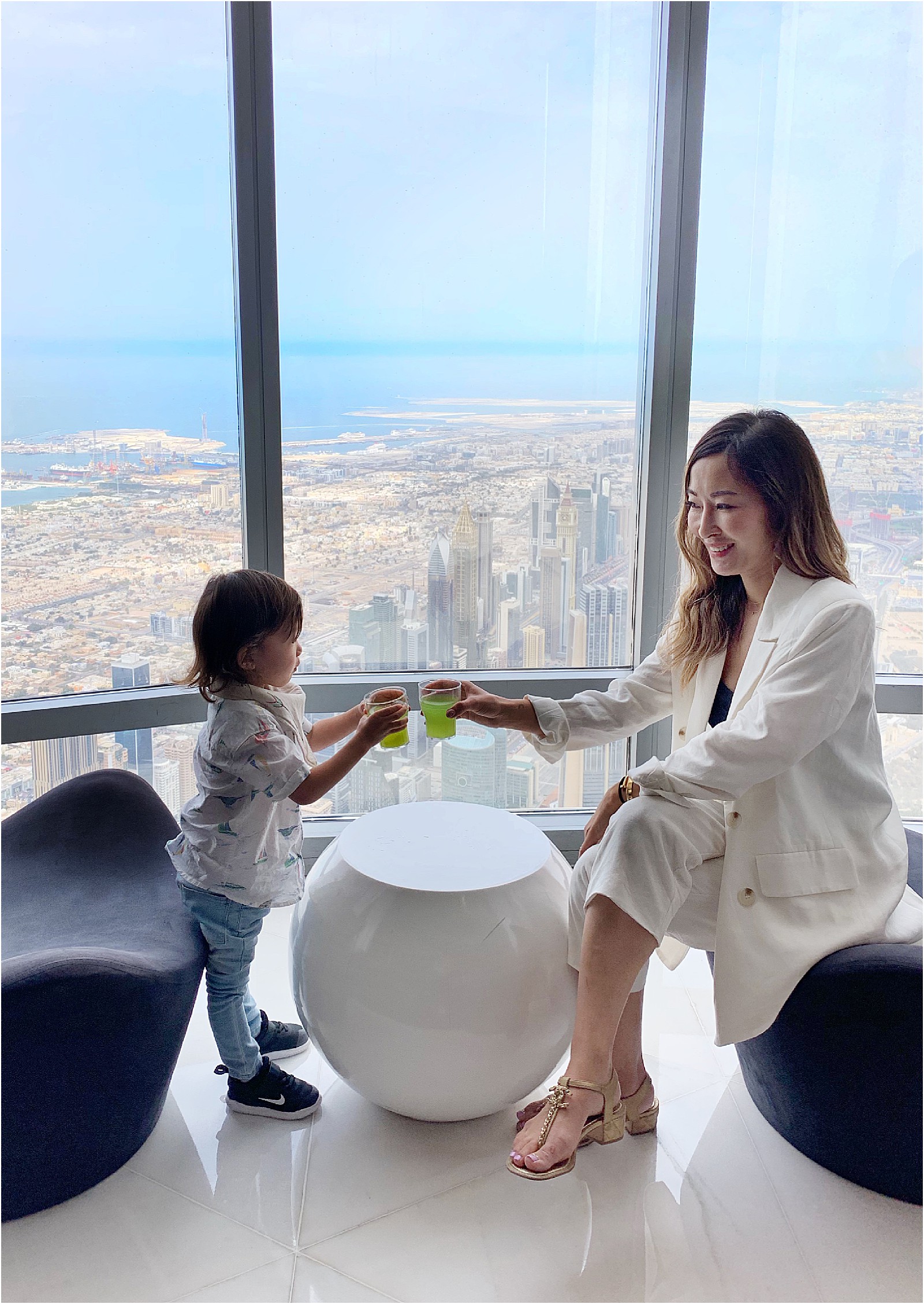 family having drinks in Burj Khalifa