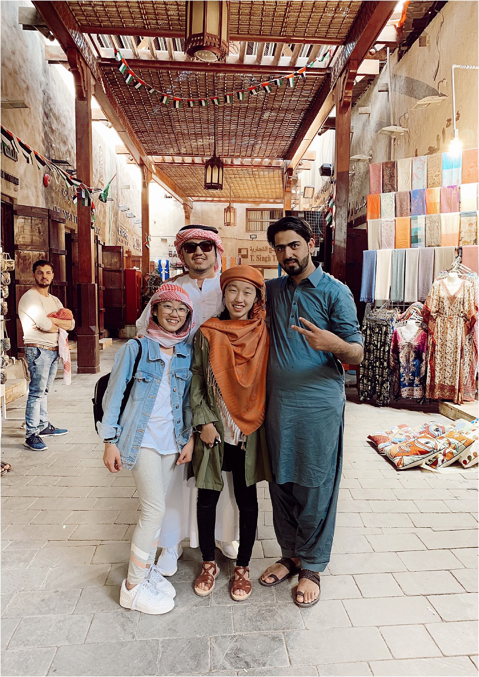 Tourists in Emirati clothing