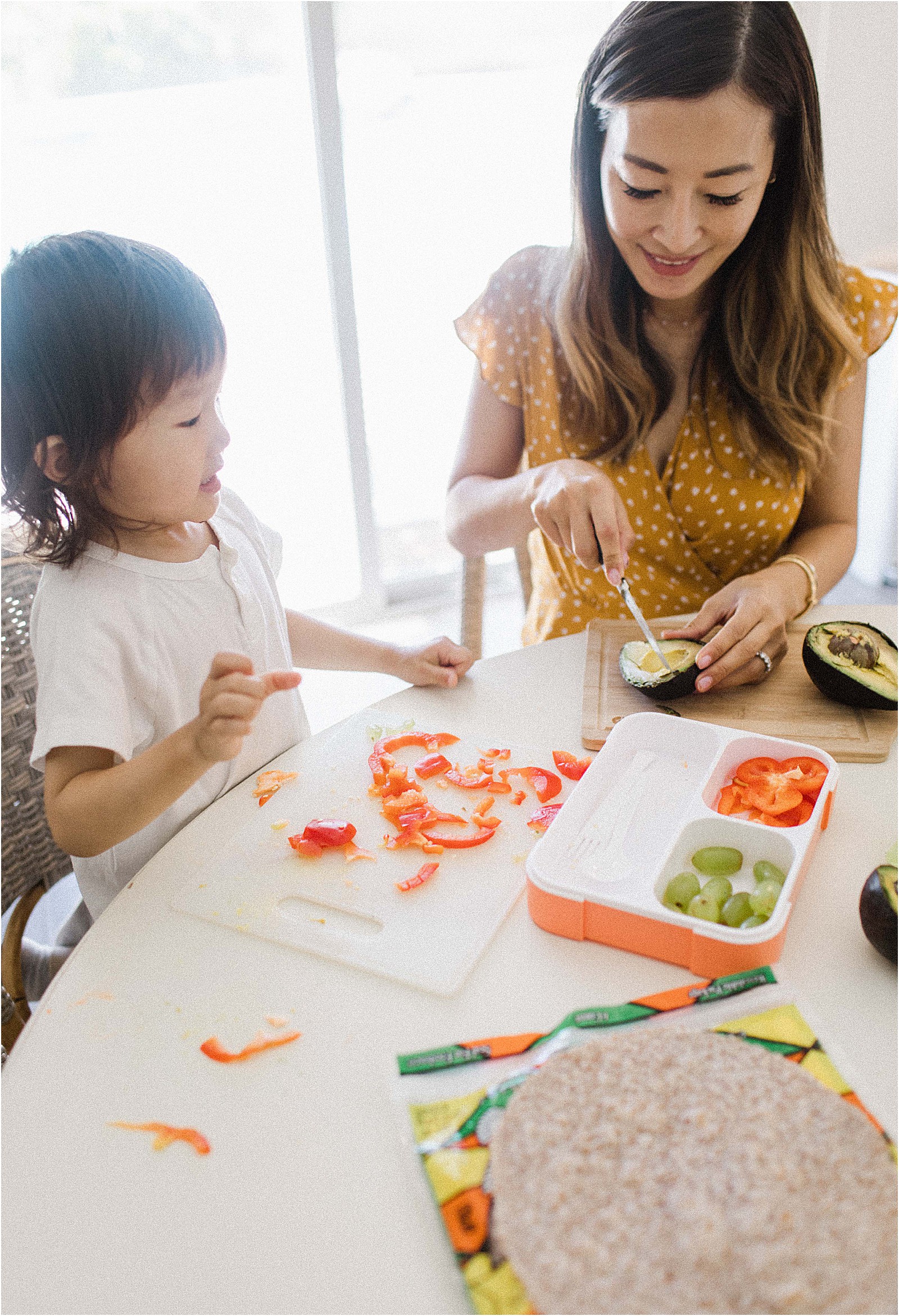 mom and son preparing snacks together