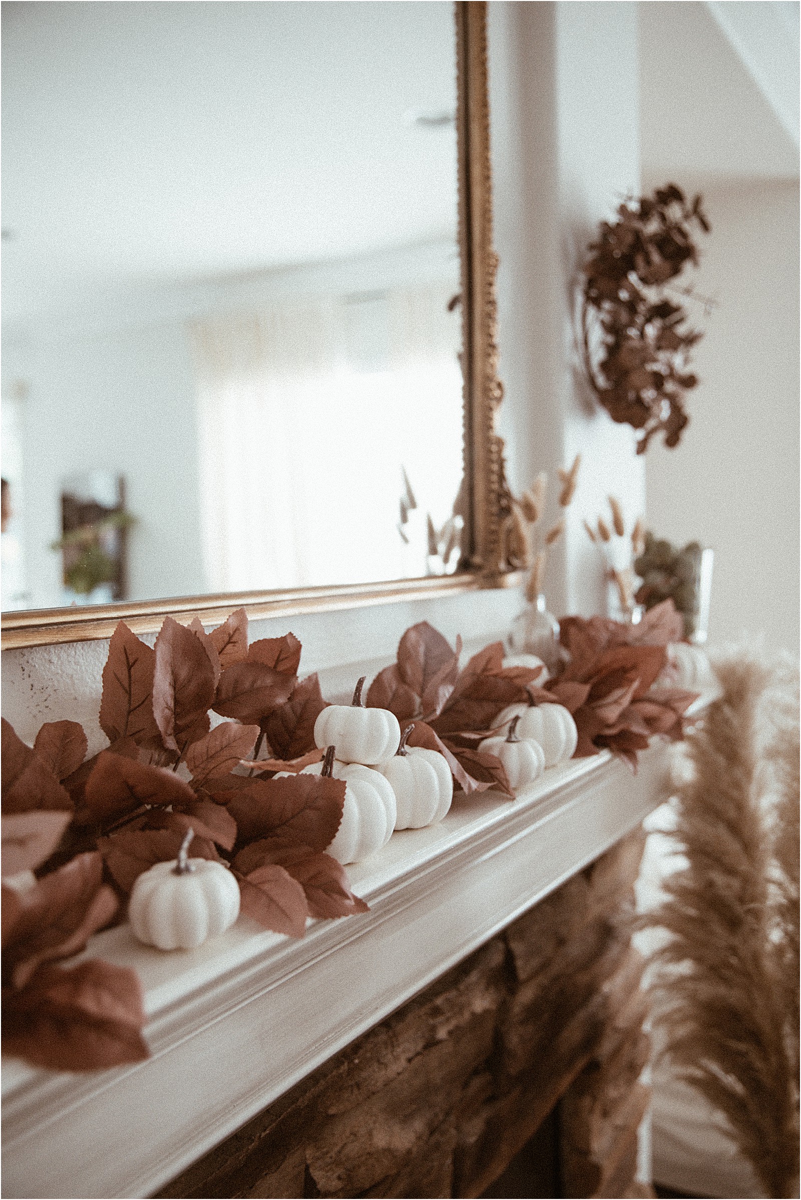 Mini pumpkins and fall leaves decor