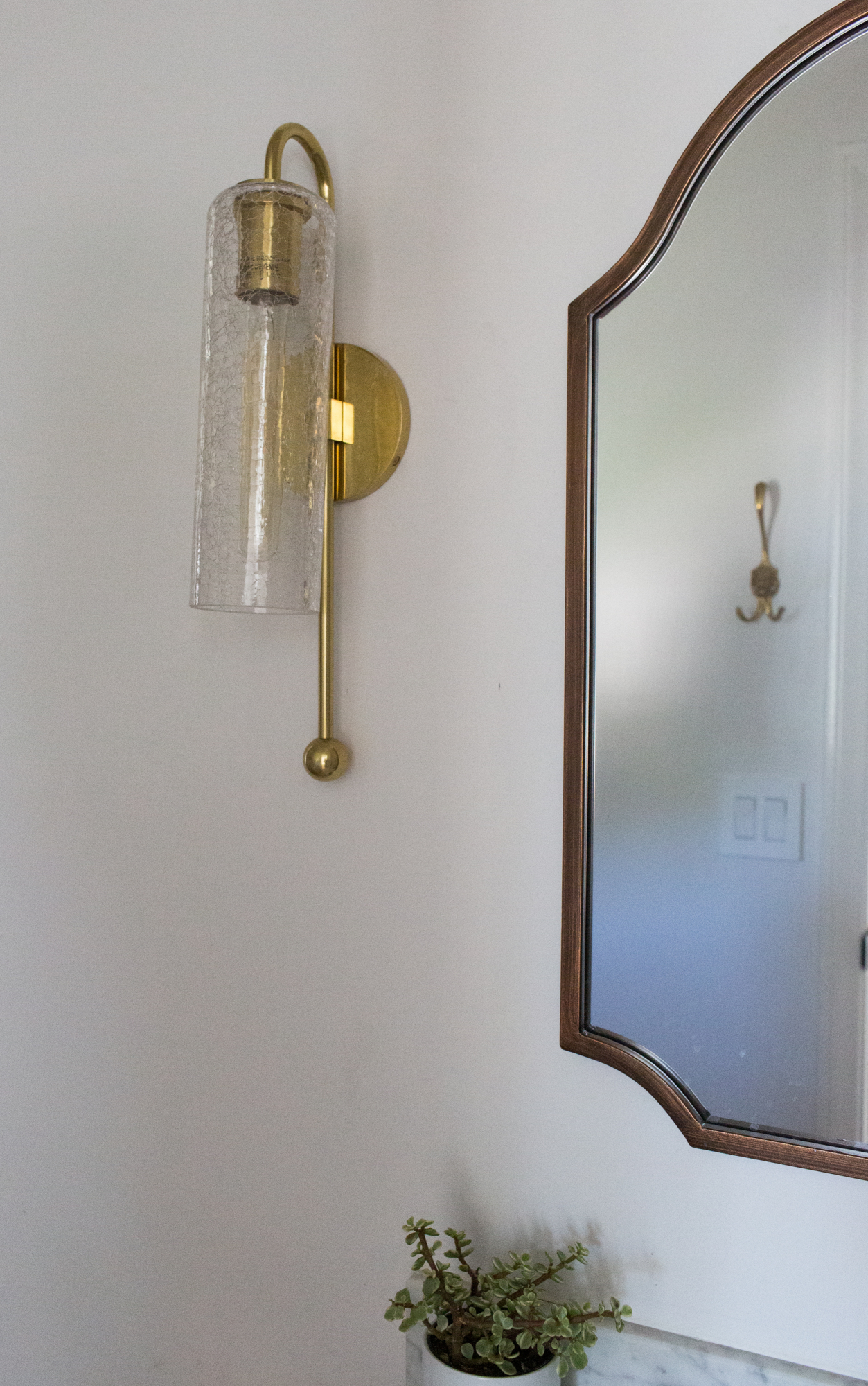 Aged brass wall sconce from Lamps Plus 